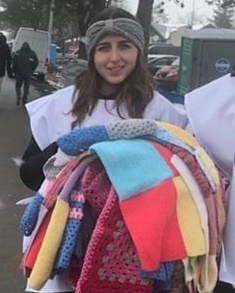 Star of Hope volunteers offer blankets at the border