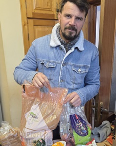 Marcel helps with the donations